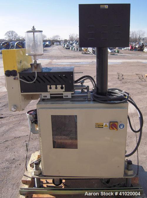 Used Conair Traveling Fly Knife Cutter, Model SCE-2L. Driven by an approximate 2 1/2 hp motor. Includes an LE-650 Cutter Control digital display. Mounts on casters.