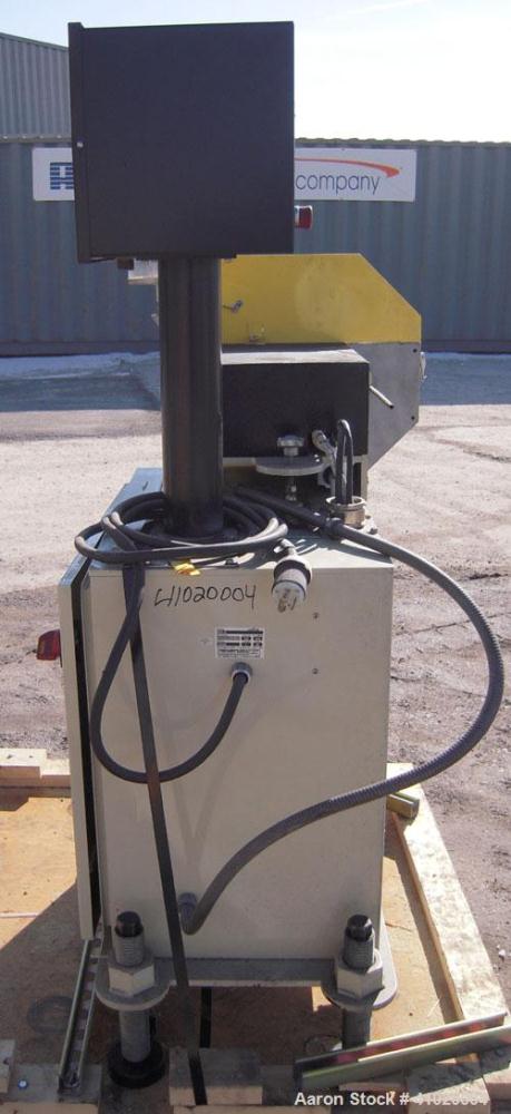 Used Conair Traveling Fly Knife Cutter, Model SCE-2L. Driven by an approximate 2 1/2 hp motor. Includes an LE-650 Cutter Control digital display. Mounts on casters.