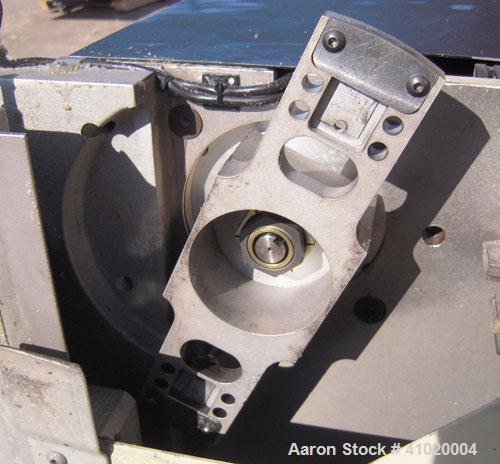 Used Conair Traveling Fly Knife Cutter, Model SCE-2L. Driven by an approximate 2 1/2 hp motor. Includes an LE-650 Cutter Control digital display. Mounts on casters.