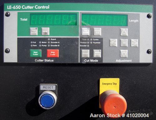 Used Conair Traveling Fly Knife Cutter, Model SCE-2L. Driven by an approximate 2 1/2 hp motor. Includes an LE-650 Cutter Control digital display. Mounts on casters.