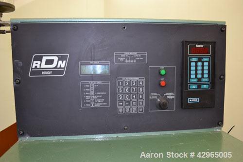  Used- RDN Rotocut Fly Knife Cutter, Model EMC-4DC. Single blade, driven by a 3hp, 180 volt, 1750/2050 rpm DC motor. Includes a control panel. Mounted on (4) adjustable legs, and casters.