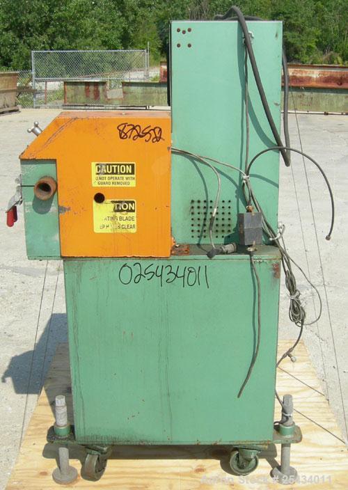Used RDN Smartcut Fly Knife Cutter, Model SC2.  2 1/4" diameter opening, single blade, driven by an approximate 2 hp motor. Includes a control panel.  Mounted on casters.