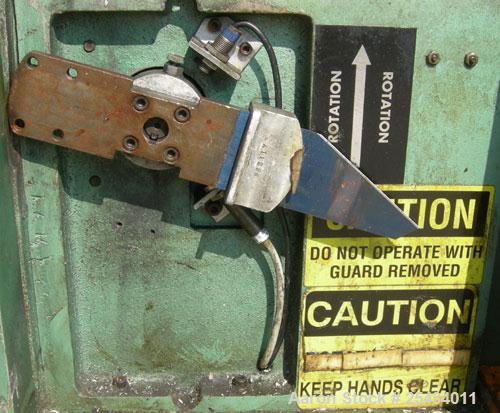 Used RDN Smartcut Fly Knife Cutter, Model SC2.  2 1/4" diameter opening, single blade, driven by an approximate 2 hp motor. Includes a control panel.  Mounted on casters.