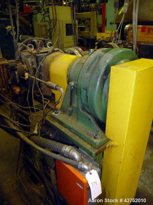 Used Maag Extrex Gear Pump, Model EX90 4STE 10/0. Driven by a 30 hp DC motor with SCR control. Includes an operator panel for pressure.