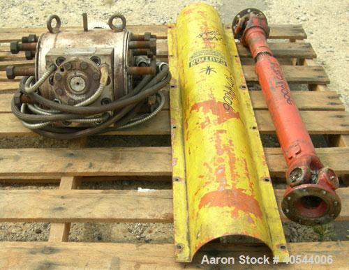 Used Maag Extrex gear pump, type 56/56. Approximately 92.6 cubic meters per revolution. Approximately 2 5/8" openings. Driven by a 15 hp, 240 volt, 1750 rpm DC motor with a reducer, ratio 20.55 to 1....