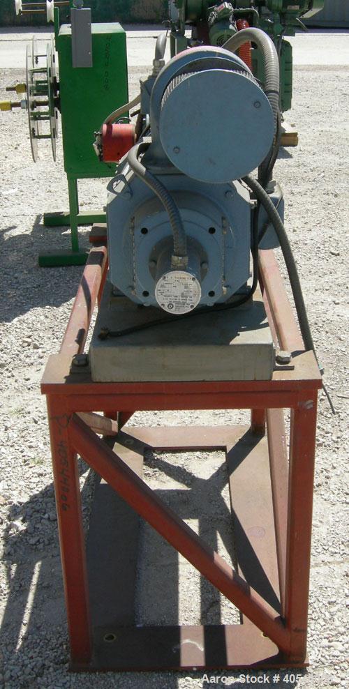 Used- Maag Extrex gear pump, type 56/56. Approximately 92.6 cubic meters per revolution. Approximately 2 5/8" openings. Driv...