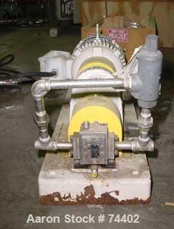 USED: Maag gear pump, model TX/22/13E, stainless steel. Approx .15liter per minute, 50-20,000 SP viscosity. 0 psi suction, 145 psidischarge. Approx 3/4" inlet/outlet. Driven by a 2 hp, 3/60/230/460vo...