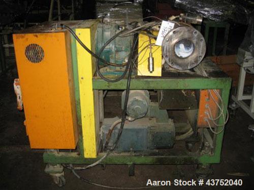 Used Maag Gear Pump. 10 Hp motor and control panel. Last used on a 4.5", 200 hp extruder. Mouunted on a cart.