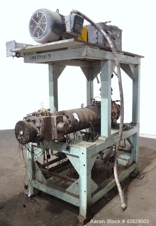 Used Extrex Gear Type Melt Pump. Driven by a 40hp, 3/60/208-230/460 volt, 1780 rpm motor with a Falk Model 284AFXD2A RAM gearbox, ratio 21.19 to 1. Floor standing vertical type support stand, approxi...