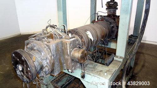 Used Extrex Gear Type Melt Pump. Driven by a 40hp, 3/60/208-230/460 volt, 1780 rpm motor with a Falk Model 284AFXD2A RAM gearbox, ratio 21.19 to 1. Floor standing vertical type support stand, approxi...