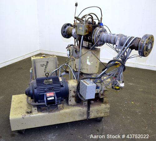 Used Gear Pump. Driven by a 10 hp, 3/60/460 volt, 1775 rpm motor thru a reducer, ratio 7.5 to 1. Mounted on a base with casters. Last used on a 3.5" extruder.