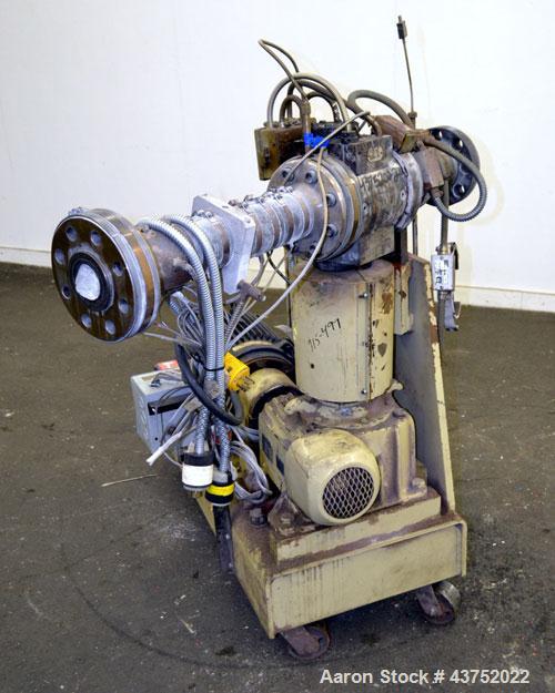 Used Gear Pump. Driven by a 10 hp, 3/60/460 volt, 1775 rpm motor thru a reducer, ratio 7.5 to 1. Mounted on a base with casters. Last used on a 3.5" extruder.
