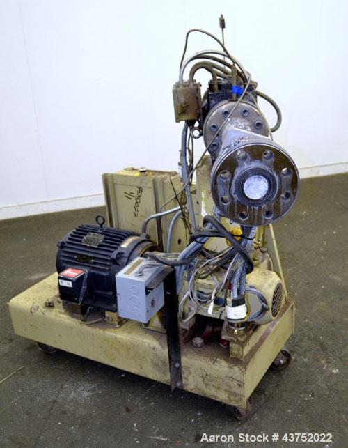 Used Gear Pump. Driven by a 10 hp, 3/60/460 volt, 1775 rpm motor thru a reducer, ratio 7.5 to 1. Mounted on a base with casters. Last used on a 3.5" extruder.