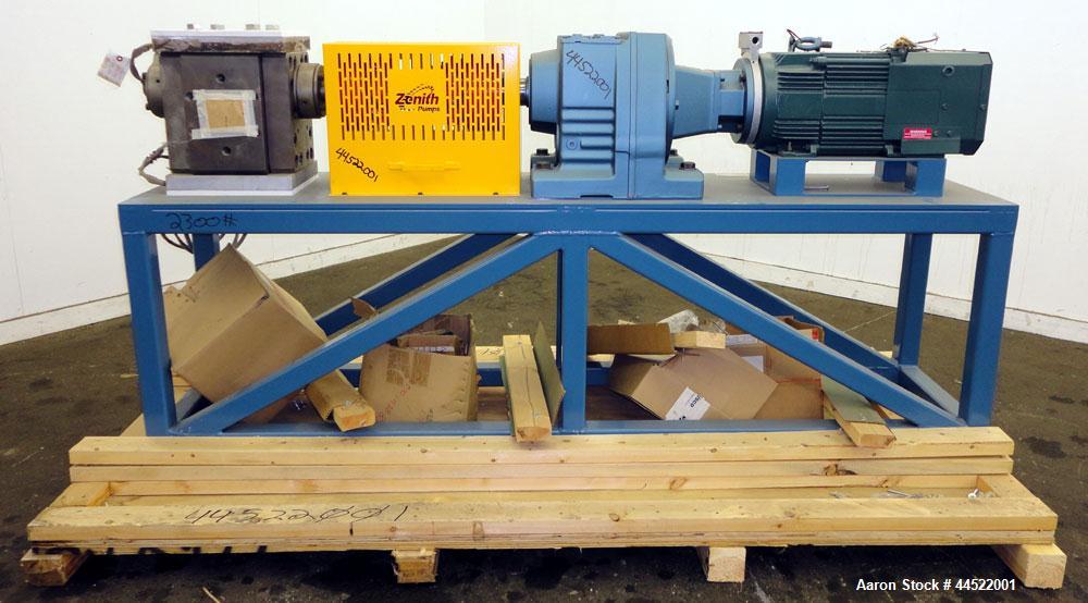 Unused- Zenith PEP-II Polymer Gear Pump, Model 60-20000-2466-4, Carbon Steel. Rated approximate 300cc per revolution, flow rate 300-3600 pounds per hour. Driven by a 20hp, 3/60/460 volt, 1775 rpm mot...