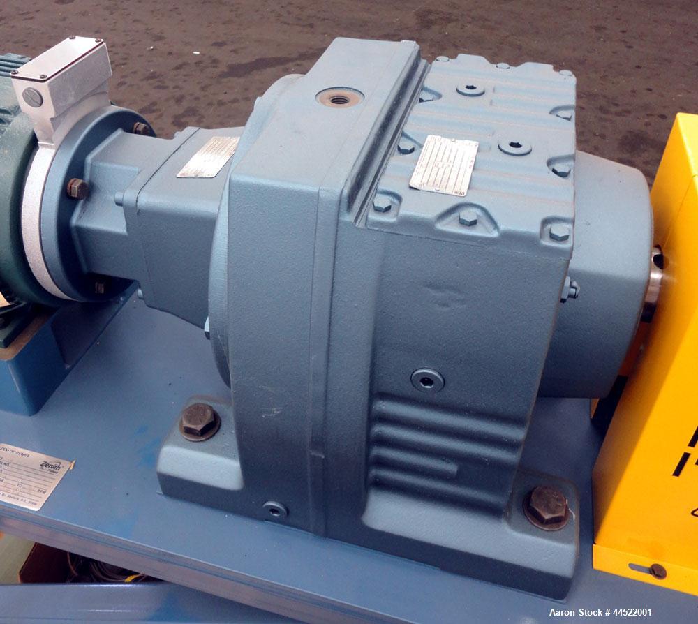 Unused- Zenith PEP-II Polymer Gear Pump, Model 60-20000-2466-4, Carbon Steel. Rated approximate 300cc per revolution, flow rate 300-3600 pounds per hour. Driven by a 20hp, 3/60/460 volt, 1775 rpm mot...