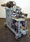 Used Maag Extrex Gear Pump, Model 56/56. Approximately 92.6 cubic meters per revolution Driven by a 10 hp, 500 volt, 1750 rpm DC motor with reducer, ratio 19.5 to 1. Mounted on a carbon steel stand w...