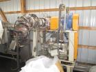 Used Maag Model 56/56 Melt Pump. Approximate 92.6 cubic meters per revolution. Includes approximately 10hp motor, NO controls. Serial# 8330 63034/2.
