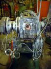 Used Maag Extrex Gear Pump, Model EX90 4STE 10/0. Driven by a 30 hp DC motor with SCR control. Includes an operator panel for pressure.