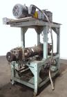 Used- Extrex Gear Type Melt Pump. Driven by a 40hp, 3/60/208-230/460 volt, 1780 rpm motor with a Falk Model 284AFXD2A RAM ge...