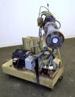 Used Gear Pump. Driven by a 10 hp, 3/60/460 volt, 1775 rpm motor thru a reducer, ratio 7.5 to 1. Mounted on a base with casters. Last used on a 3.5