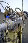 Used Gear Pump. Driven by a 10 hp, 3/60/460 volt, 1775 rpm motor thru a reducer, ratio 7.5 to 1. Mounted on a base with casters. Last used on a 3.5