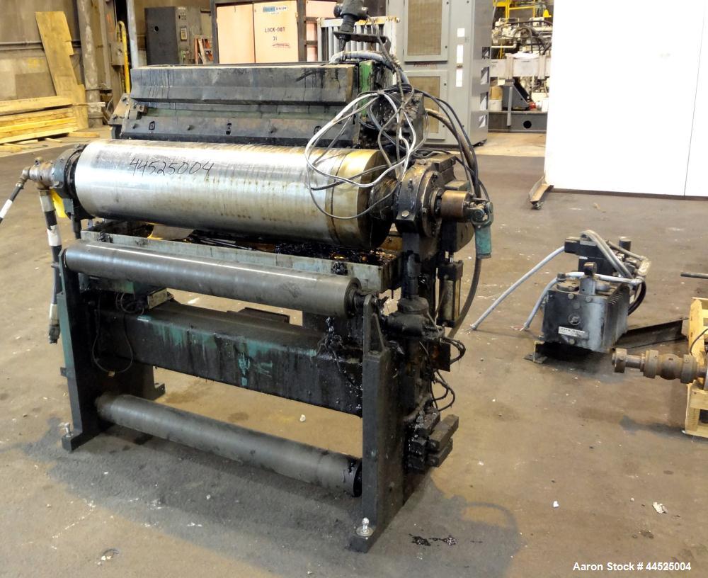 Used Genik Knife-Over-Roll Coater. 12" diameter x 44" face. single roll, chrome plated, water chilled with stationary scraper knife. Manual jack attachment to adjust gap.