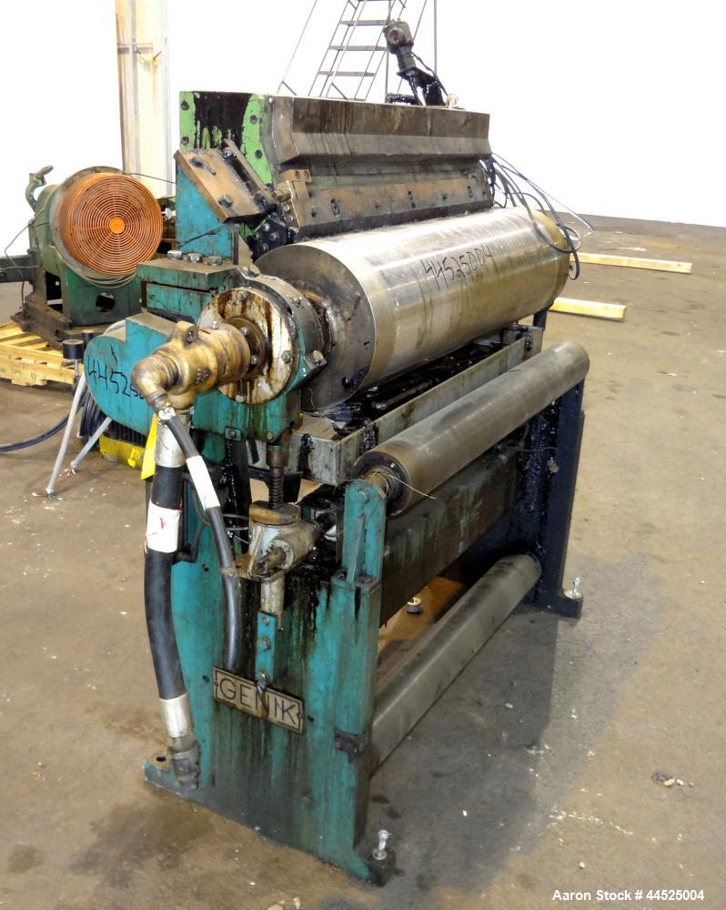 Used Genik Knife-Over-Roll Coater. 12" diameter x 44" face. single roll, chrome plated, water chilled with stationary scraper knife. Manual jack attachment to adjust gap.