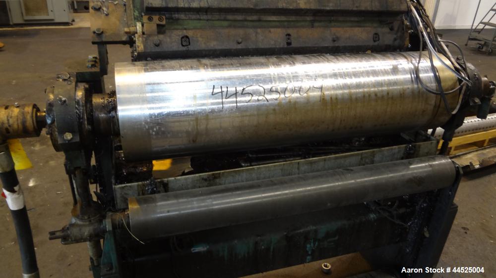 Used Genik Knife-Over-Roll Coater. 12" diameter x 44" face. single roll, chrome plated, water chilled with stationary scraper knife. Manual jack attachment to adjust gap.