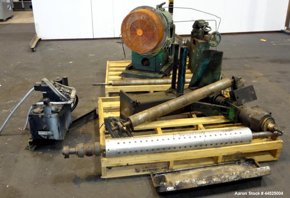 Used Genik Knife-Over-Roll Coater. 12" diameter x 44" face. single roll, chrome plated, water chilled with stationary scraper knife. Manual jack attachment to adjust gap.