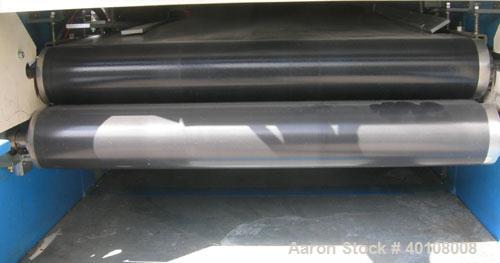 Used Glenro Laminator, Model GOL-24HC. Maximum working width 24'', speed range 3-40 feet per minute, effective heated length 35 3/4'', maximum product thickness 1/4'', maximum temp 200 degrees C. Dri...