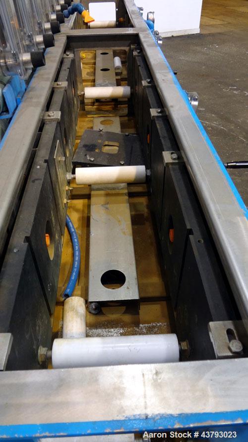 Used Custom Downstream Systems Vacuum Calibration Table, Model CVC 10-25. 304 Stainless steel tank approximate 14" wide x 97" long x 13" deep, table 25-1/2" wide x 120" long. Includes a plastic top t...