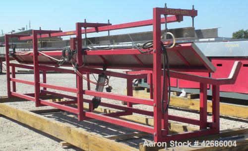 Used Crown Dump Table. 13" Wide x 203" long stainless steel dump table with tilt cylinder. (2) Stainless steel guide rails. Tipping speed can be adjusted with exhaust throttle vale. Mounted on a carb...