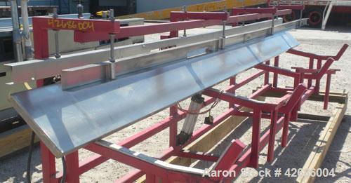Used Crown Dump Table. 13" Wide x 203" long stainless steel dump table with tilt cylinder. (2) Stainless steel guide rails. Tipping speed can be adjusted with exhaust throttle vale. Mounted on a carb...