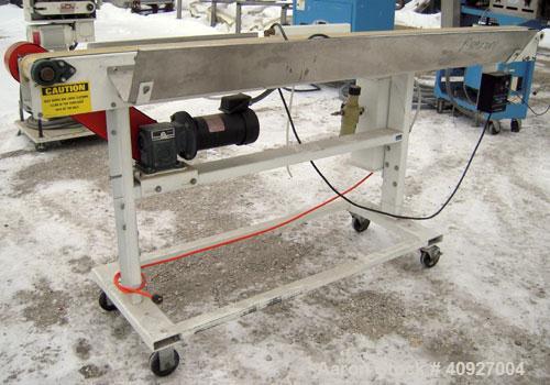 Used Goodman Belt Conveyor. 4" wide x 94" long rubber belt, driven by a 112 HP DC motor thru a reducer. Includes a DC speed controller.