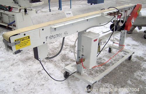 Used Goodman Belt Conveyor. 4" wide x 94" long rubber belt, driven by a 112 HP DC motor thru a reducer. Includes a DC speed controller.