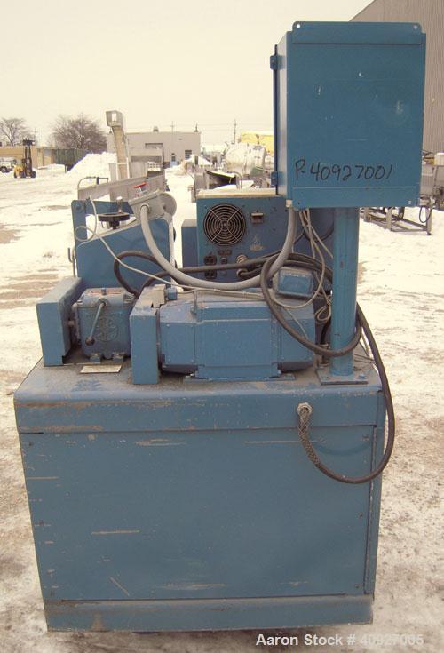 Used Versa Fly Knife Cutter/Puller. (1) Blade fly knife driven by a 3/4 HP, 115/230 Volt, 1725 RPM motor, (2) 2" wide x 4" diameter manually adjustable pull rolls, driven by a 1 1/2 HP, 180 Volt DC m...