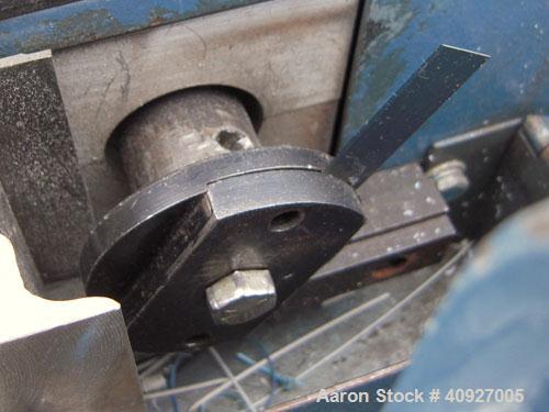 Used Versa Fly Knife Cutter/Puller. (1) Blade fly knife driven by a 3/4 HP, 115/230 Volt, 1725 RPM motor, (2) 2" wide x 4" diameter manually adjustable pull rolls, driven by a 1 1/2 HP, 180 Volt DC m...