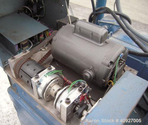 Used Versa Fly Knife Cutter/Puller. (1) Blade fly knife driven by a 3/4 HP, 115/230 Volt, 1725 RPM motor, (2) 2" wide x 4" diameter manually adjustable pull rolls, driven by a 1 1/2 HP, 180 Volt DC m...
