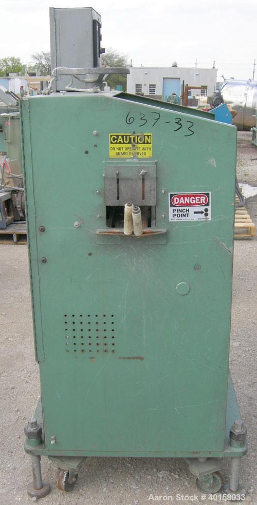  Used- RDN belt puller, model 118-5A. 3" wide x 20" long contact length rubber belts, manually adjustable. Driven by a 2 hp, 180 volt DC gearmotor. Includes a Contrx M-drive panel. Built 1995.