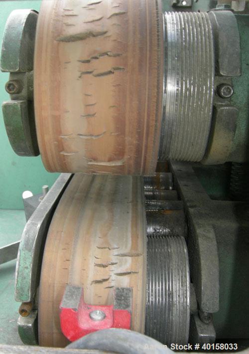  Used- RDN belt puller, model 118-5A. 3" wide x 20" long contact length rubber belts, manually adjustable. Driven by a 2 hp, 180 volt DC gearmotor. Includes a Contrx M-drive panel. Built 1995.