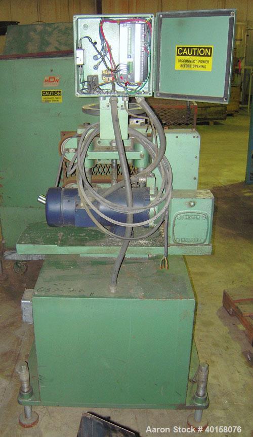 Used RDN belt puller, model 218-3. 3" wide x 18" long contact length belts, manually adjustable. Driven by a 1 1/2 hp motor. Includes operator panel.