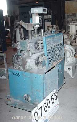 USED:Puller, manually adjustable cleated belts, 3" wide x 29" longcontact area. Driven by a 2 hp DC gearmotor. Includes a Focus 1 DCdrive controller.