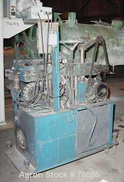 USED:Puller, manually adjustable cleated belts, 3" wide x 29" longcontact area. Driven by a 2 hp DC gearmotor. Includes a Focus 1 DCdrive controller.