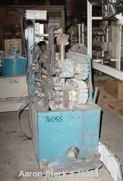 USED:Puller, manually adjustable cleated belts, 3" wide x 29" longcontact area. Driven by a 2 hp DC gearmotor. Includes a Focus 1 DCdrive controller.