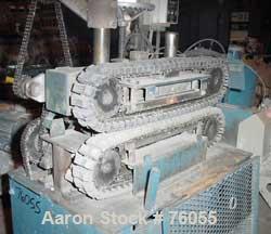 USED:Puller, manually adjustable cleated belts, 3" wide x 29" longcontact area. Driven by a 2 hp DC gearmotor. Includes a Focus 1 DCdrive controller.
