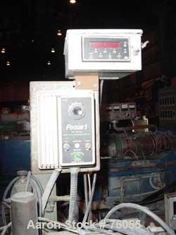 USED:Puller, manually adjustable cleated belts, 3" wide x 29" longcontact area. Driven by a 2 hp DC gearmotor. Includes a Focus 1 DCdrive controller.