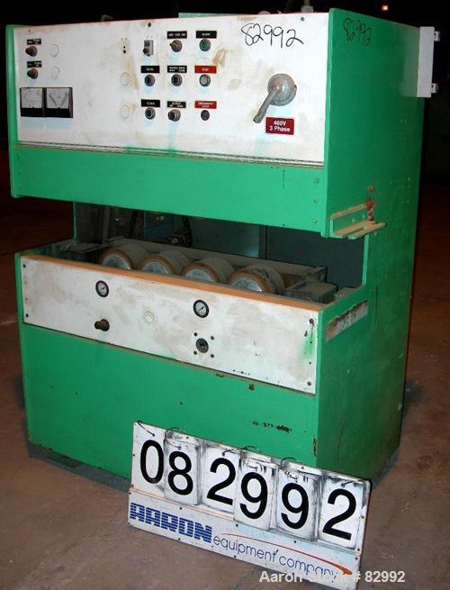 USED: Puller, wheel type. (8) 4" wide x 24" contact area, pneumatically adjustable rubber wheels. Approximately 5" max daylight. Driven by a 2 hp, 180 volt DC gearmotor.