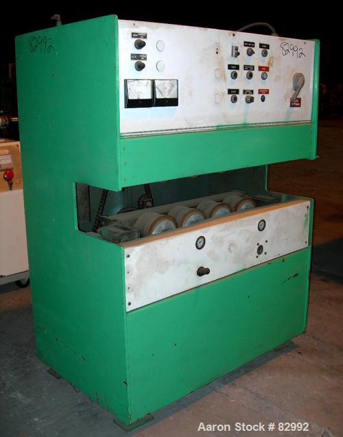USED: Puller, wheel type. (8) 4" wide x 24" contact area, pneumatically adjustable rubber wheels. Approximately 5" max daylight. Driven by a 2 hp, 180 volt DC gearmotor.