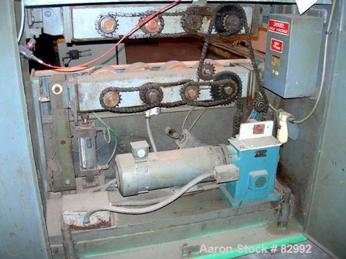 USED: Puller, wheel type. (8) 4" wide x 24" contact area, pneumatically adjustable rubber wheels. Approximately 5" max daylight. Driven by a 2 hp, 180 volt DC gearmotor.