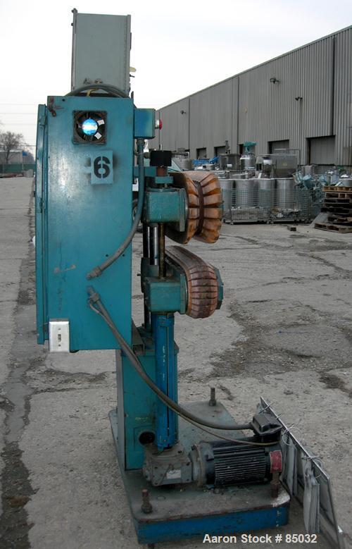 USED: Puller, (2) 4" wide x 25" long contact area, manually adjustable cleated belts. Driven by a 1.5 hp DC gearmotor. Includes a Powertec 500 panel.